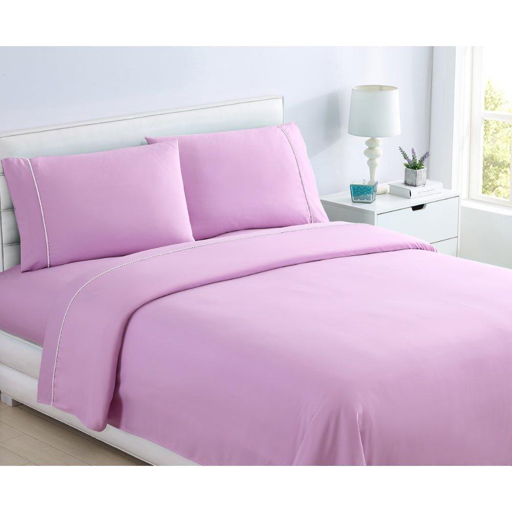https://spiritlinen.com/cdn/shop/products/spirit-linen-home-bed-sheets-set-4pc-pom-pom-sweet-dream-ultra-soft-microfiber-sheet-set-with-fitted-sheet-flat-sheet-pillowcases-118031.jpg?v=1709258978&width=1000